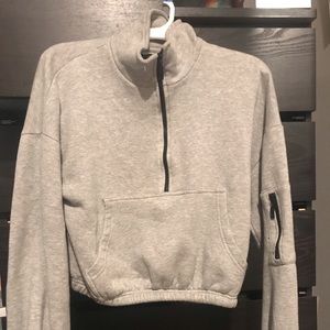 Cropped front zip sweater
